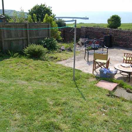 Client wanted a new garden with plenty of space for entertaining with a seaside theme and coastal planting.